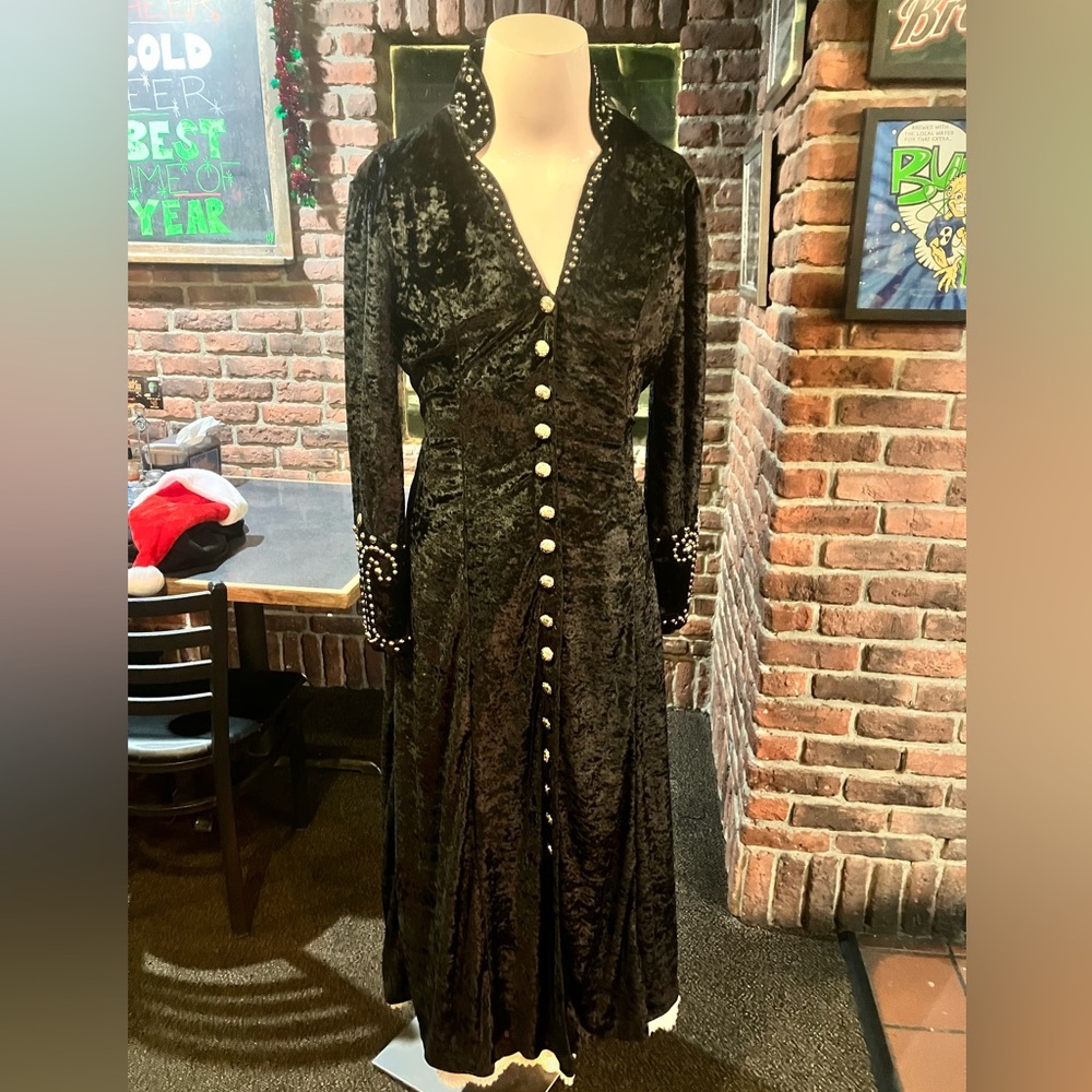 Fitted, floor-length crushed velvet and silver detail duster-dress.